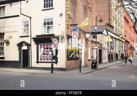 People walking along Canal street, the centre of Manchester`s Gay Village. Manchester, England, UK Stock Photo